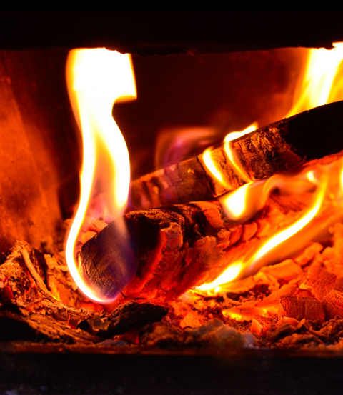 burning seasoned wood in stove