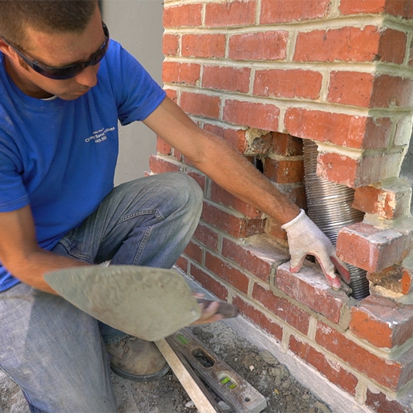 Repairing masonry chimney in Fan district VA