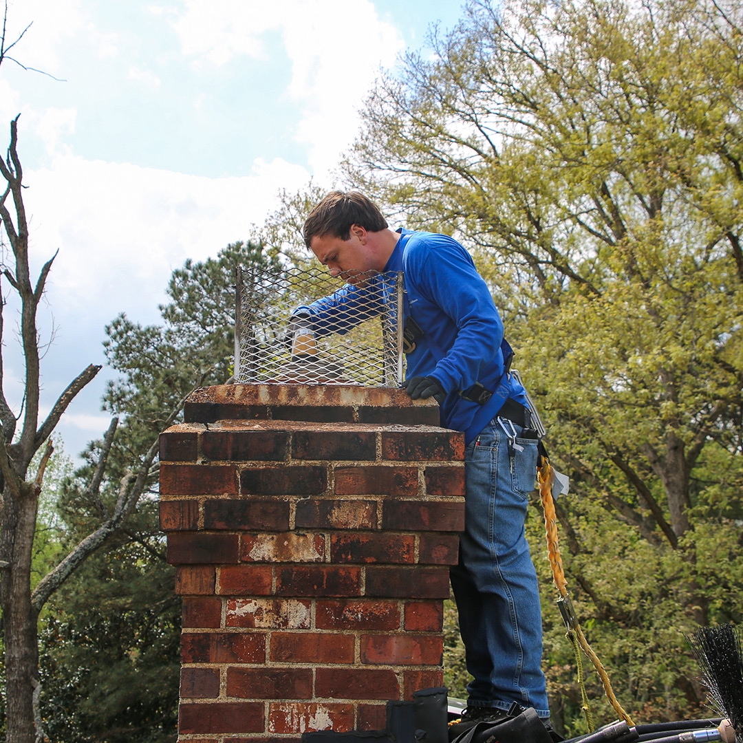 Chimney sweep inspecting chimney in Short Pump, Virginia