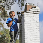 Spalled brick being replaced in Richmond, VA.
